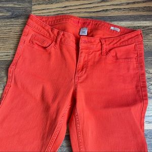 Orange skinny jeans